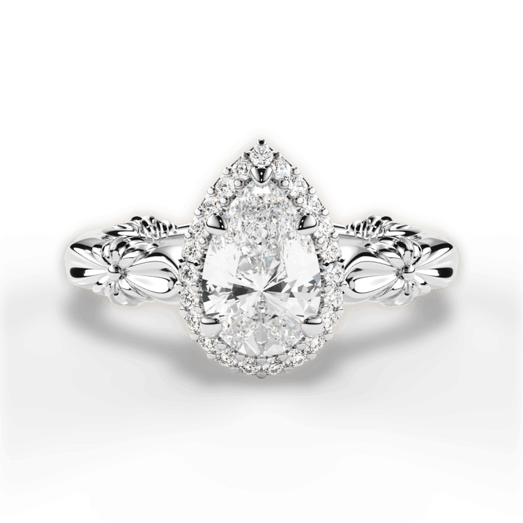 The Gemma Halo / 6.03 Carat Pear Yellow Diamond