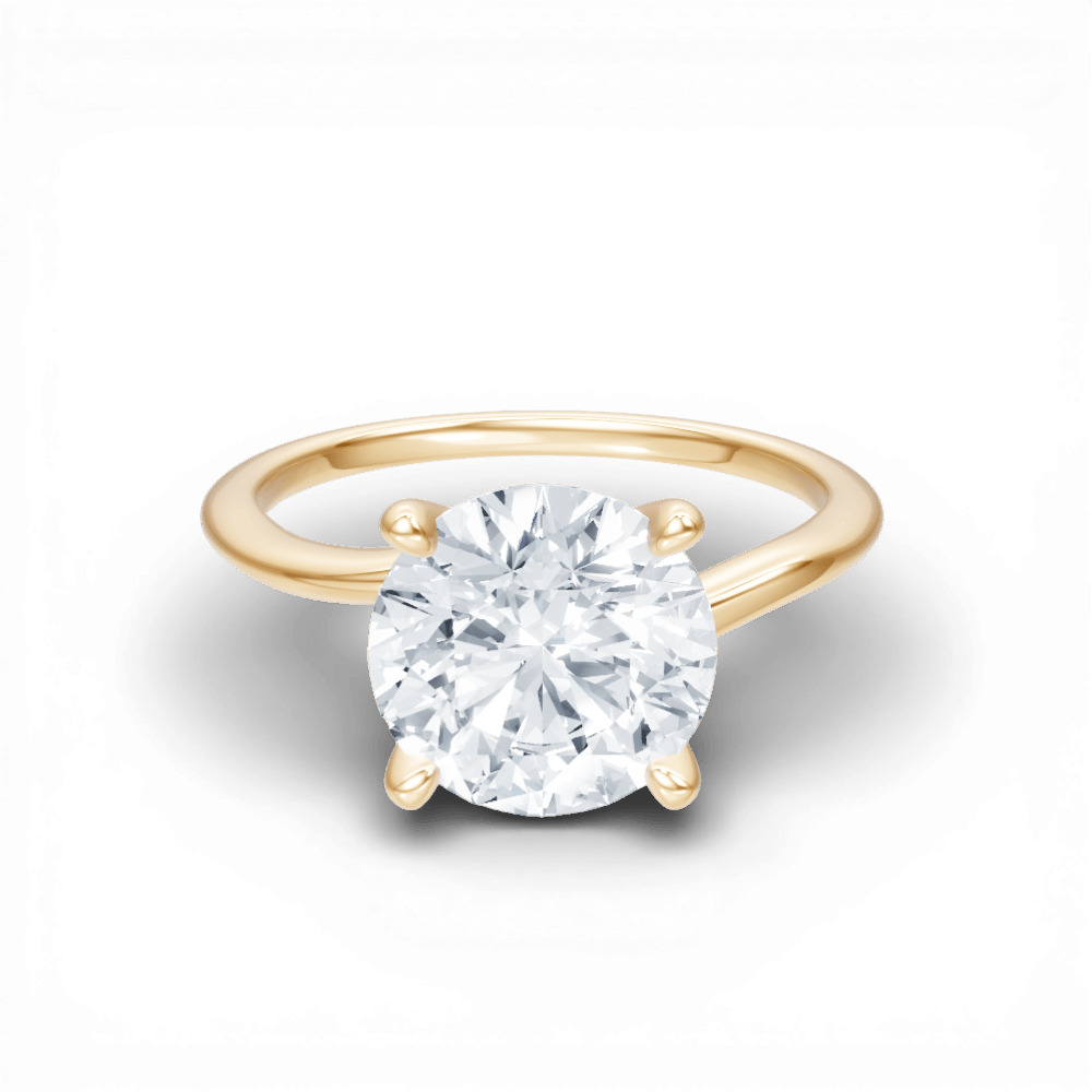 The Geneva Round Cut 14kt Yellow Gold Four-Prong Solitaire Engagement Ring