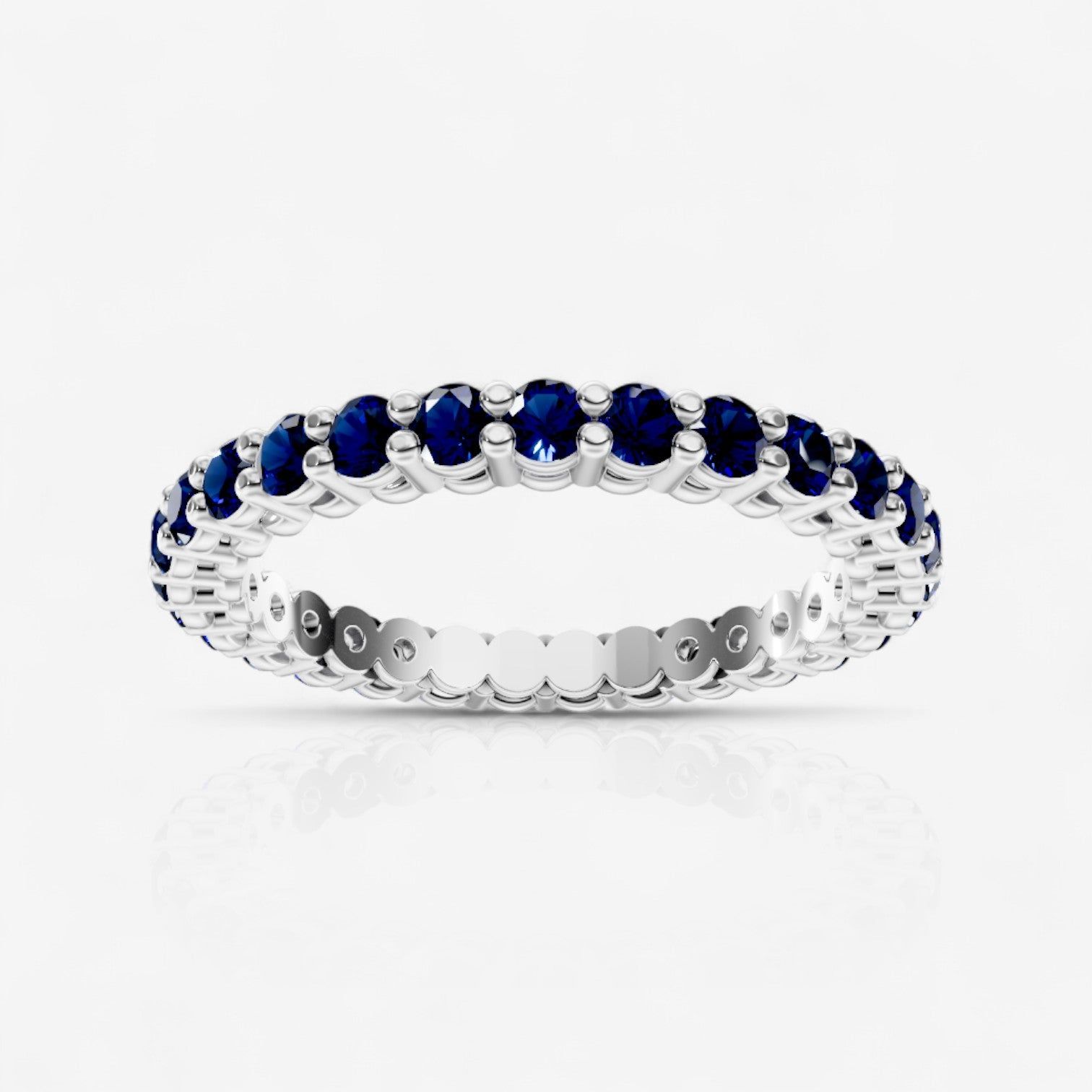 Round Shared Prong Sapphire Eternity Band