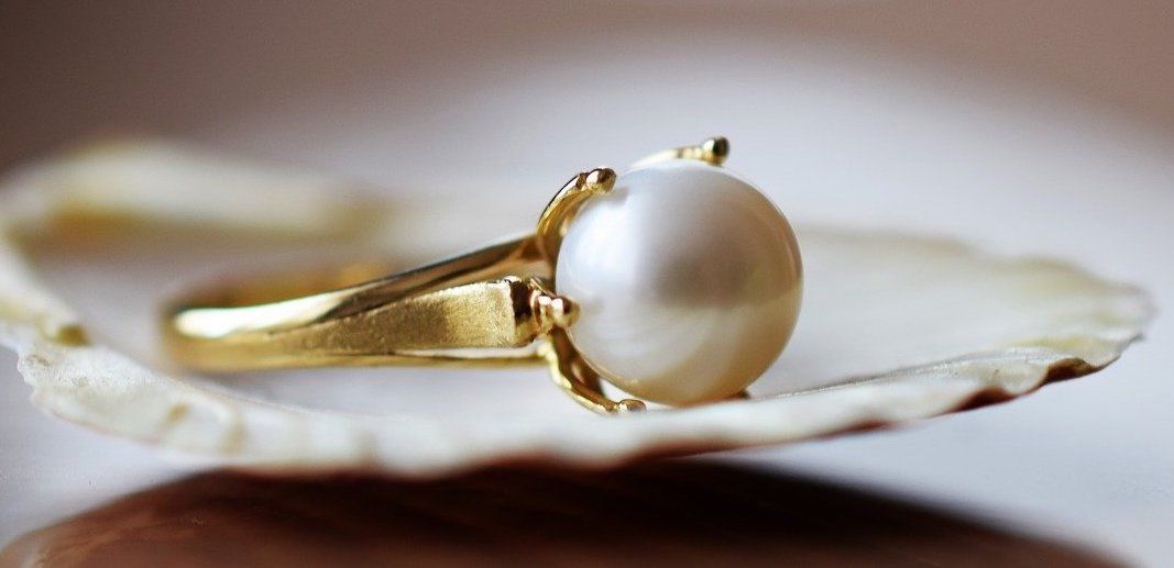 yellow gold pearl engagement ring