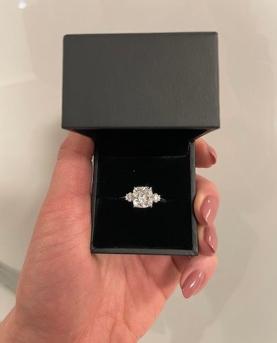 cushion cut diamond engagement ring in a Ritani ring box