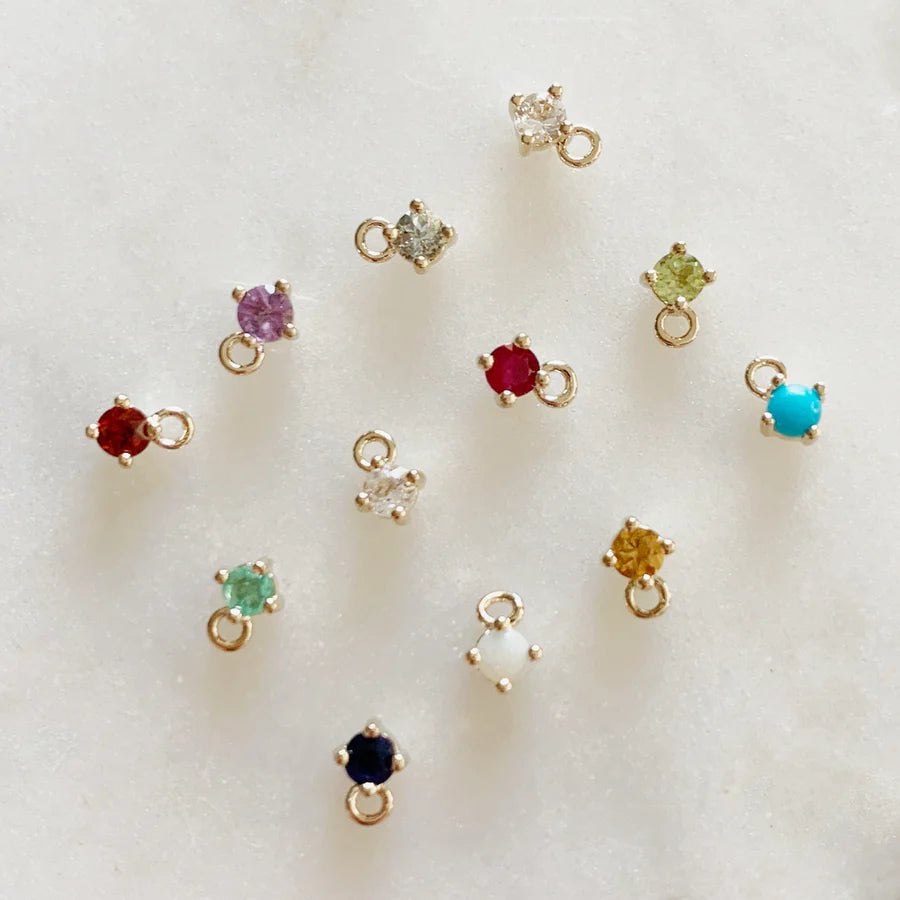 April - White Topaz/May - Emerald/June - Moonstone/July - Ruby/August - Peridot/September - Sapphire/October - Opal/November - Citrine/December - Turquoise/side