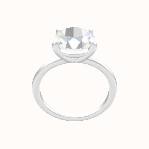 Classic Solitaire Engagement Ring With Low Set Four Prong Head